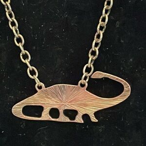 19” gold tone necklace & 2” sauropods long neck dinosaur pendant & 3” extender
